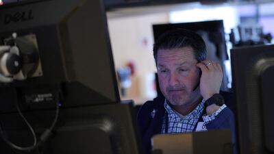 A trader on the floor of the New York Stock Exchange. The drop in yields has so far been a boon for equities, especially tech and other large growth stocks whose relatively strong performance helped support the benchmark S&P 500. Reuters
