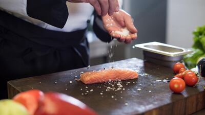 According to the Salt Institute, healthy adults should consume up to a teaspoon of salt every day. Getty