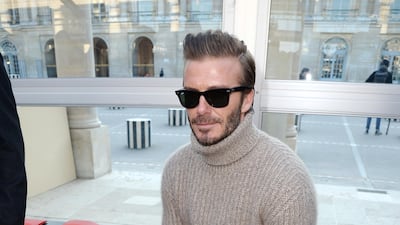 David Beckham, in Louis Vuitton, attends the Louis Vuitton menswear show at Paris Fashion Week on January 19, 2017 in Paris, France. Getty Images