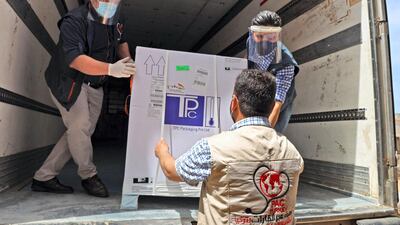 A batch of AstraZeneca Covid-19 vaccines is delivered to north-western Syria's Idlib province as part of the Covax initiative. AFP