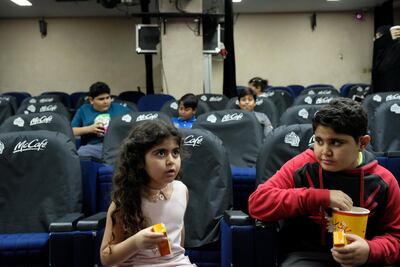 Children are seen inside the first cinema in Jeddah, Saudi Arabia on January 13, 2018. Reem Baeshen / Reuters