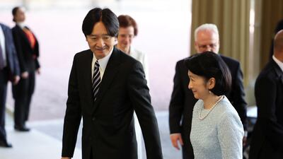 Japanese Crown Prince Fumihito and Crown Princess Kiko arrive at the reception. Reuters