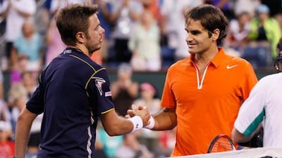 Roger Federer, right, found it relatively difficult to beat compatriot and 'good friend' Stanislas Wawrinka in Indian Wells.