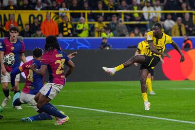 Borussia Dortmund's Guinean forward Serhou Guirassy scores his team's third goal. AFP