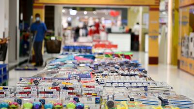 Each year, families spend thousands of dirhams on school uniforms, bags, shoes, caps and sports kits before the new term. Khushnum Bhandari / The National