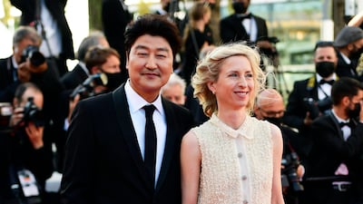 Song Kang-ho and Jessica Hausner attend 'The Story of my Wife' screening during the 74th annual Cannes Film Festival on July 14, 2021