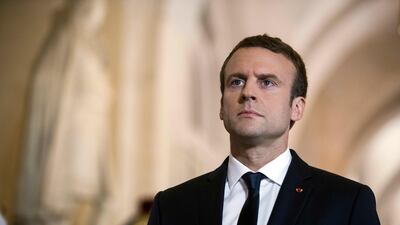 French president Emmanuel Macron walks through the Galerie des Bustes to access the Versailles Palace's hemicycle where both houses of parliament were gathered, outside Paris, on July 3, 2017. Etienne Laurent / Pool Photo via AP