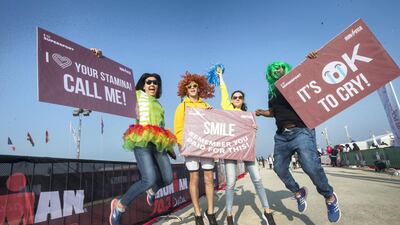 Spectators show their support at Jumeirah beach. Leslie Pableo for The National