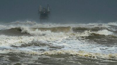 Larger than usual waves come ashore at Crystal Beach as Hurricane Harvey approaches Texas. Guiseppe Barranco / The Beaumont Enterprise via AP