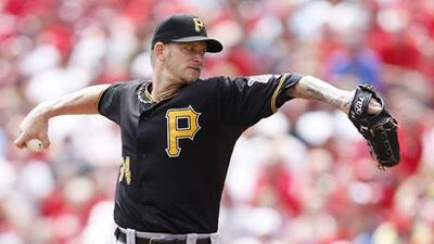 Pittsburgh's AJ Burnett pitches against Cincinnati Reds