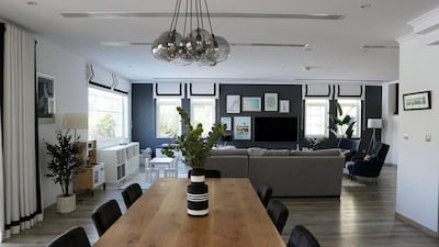 Tactile cushions, velvet chairs and a luxurious rug added to the cosy vibe. Pawan Singh / The National