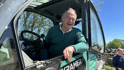 Liberal Democrats leader Ed Davey grabs a photo opportunity on a visit to Stanbridge dairy farm, Hampshire. PA