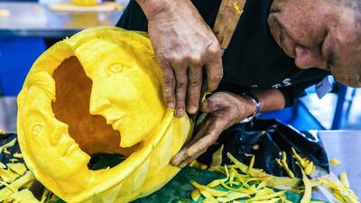 A competitor carves out a squash during the Salon Culinaire competition at Gulfood.