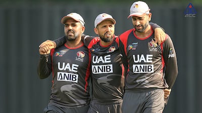 Rohan Mustafa, centre, and Ahmed Raza were two of three players fined and suspended for their comments on social media. Courtesy ACC