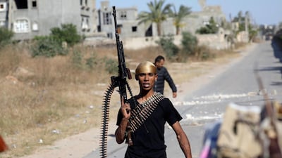 A member of the Libyan internationally recognised government forces is seen during a fight with Eastern forces in al-Yarmouk south of Tripoli, Libya May 7, 2019. Reuters