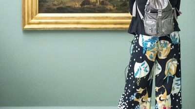 A woman looks at, The Shepherdess of the Alps by artist Joseph Vernet. Christopher Pike / The National