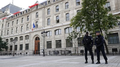 French police and security forces establish a security perimeter near Paris police headquarters. EPA