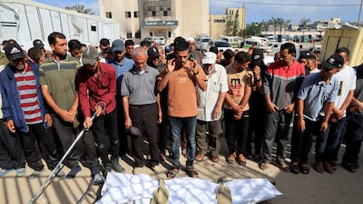 Mourners pray for a Palestinian killed near Rafah by what Gaza health officials said was Israel fire. Reuters