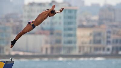 Orlando Duque of Clombia takes his dive during the Red Bull Cliff Diving World Series 2014. Yamil Lage/AFP