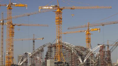 Abu Dhabi Airports on May 5 said that the Midfield Terminal Building, which will more than double capacity at Abu Dhabi International Airport, is on track to open in the summer of 2017. Above, the 80-metre arch span of the Midfield Terminal being built. Mona Al Marzooqi / The National