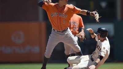 Astros rookie Carlos Correa, left, has helped Houston achieve lift-off. Thearon W Henderson / AFP