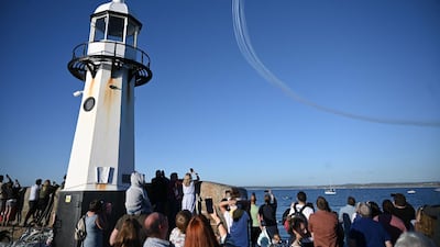 The Red Arrows fly over Carbis Bay and St Ives during the G7 summit. AFP