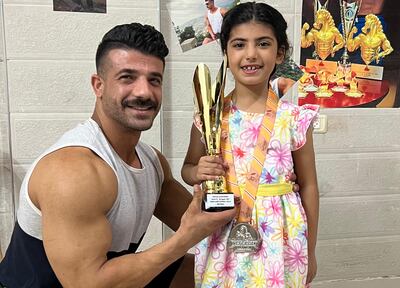 Maher Haboush with his daughter