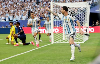 Argentina's Lionel Messi celebrates scoring their first goal as Cape Verde's Vozinha looks on. Reuters