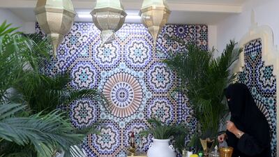 A bukhoor seller in her stall.