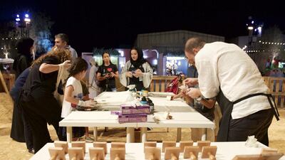 Visitors of Warehouse421 take part in a stamp workshop. Vidhyaa for the National