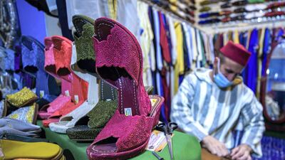 A shoe maker plying his trade at the Moroccan pavilion of the Sheikh Zayed Heritage Festival.