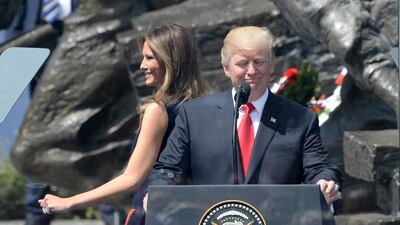 US president Donald Trump smiles next to First Lady Melania Trump in Krasinski Square, Warsaw, during a visit to Poland on July 6, 2017, before travelling on to the German city of Hamburg for the annual G20 summit. Alik Keplicz / AP Photo