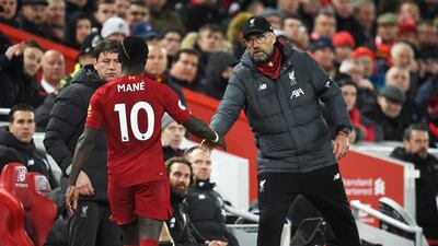 Liverpool manager Juergen Klopp shakes hands with Sadio Mane. Reuters