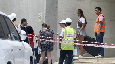 Some Torch tower residents were allowed back in on August 5 to collect their belongings, pictured above. On Tuesday, those on the lower levels were allowed to move back in permanently. Pawan Singh / The National.