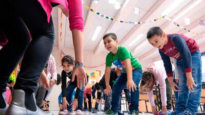 A German language class is under way for recently arrived migrant children in Vienna, Austria. AFP