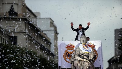 Real Madrid’s captain Sergio Ramos celebrates at Cibeles fountain after winning the UEFA Champions League REUTERS/Susana Vera