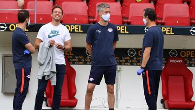 RB Leipzig coach Julian Nagelsmann, second left, and staff before the German Bundesliga match against Mainz. EPA