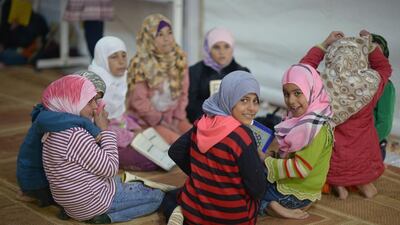From today, the Big Heart Campaign is to provide education for the children in refugee camps, such as these girls in Zaatari. Jeff J Mitchell / Getty Images