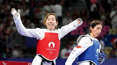 Refugee Paralympic Team's Zakia Khudadadi celebrates victory over Turkey's Nurcihan Ekinci during the Women K44 -47kg Repechage at the Grand Palais on day one of the Paris 2024 Summer Paralympic Games. PA