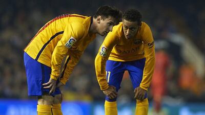 Neymar, right, and Lionel Messi of Barcelona speak during their Primera Liga match against Valencia at Estadi de Mestalla on December 05, 2015 in Valencia, Spain. (Photo by Manuel Queimadelos Alonso/Getty Images)