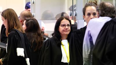 One of Salah Abdeslam's lawyers, Delphine Paci, centre, during the last day of the trial over the Brussels attacks. AP