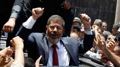 'Thank God, who guided the people of Egypt to this right path, the path of freedom and democracy,' said Mohammed Morsi who claims to have won the election.