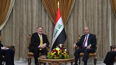 Mr Pompeo with Iraq's President Barham Saleh. AFP Photo