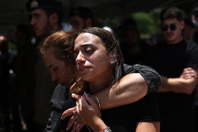 Mourners during the funeral of Israeli soldier Elay Elisha Lugasi in Kirat Shmona, near the Israeli-Lebanon border on July 4, 2024. EPA