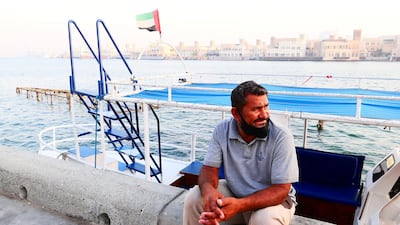 Small boat owners, however, are still trying to get back on their feet. Mohammed Akram is seen here waiting for customers who would want to use his boat for a sightseeing trip