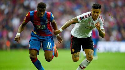 Wilfried Zaha of Crystal Palace battles with Marcos Rojo of Manchester United during the FA Cup Final match between Manchester United and Crystal Palace at Wembley Stadium on May 21, 2016 in London, England. (Shaun Botterill/Getty Images)