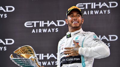 Lewis Hamilton, pictured celebrating victory in the 2019 Abu Dhabi Grand Prix, is looking to win a record-equalling seventh world crown. AFP