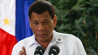 President Rodrigo Duterte delivers a message before departure from the Ninoy Aquino International Airport in Manila. Rolex Dela Pena / EPA