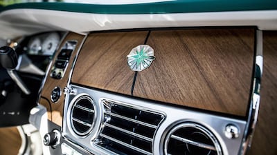 The bespoke Rolls feature inlaid emeralds and mother of pearl. Courtesy : Rolls-Royce Motor Cars