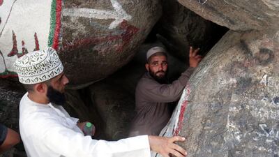 Pilgrims head towards the Hira grotto where Prophet Mohammed is alleged to have received the first verses of Quran from the Angel Jibril (Gabriel), in Mecca, Saudi Arabia. Amel Pain / EPA